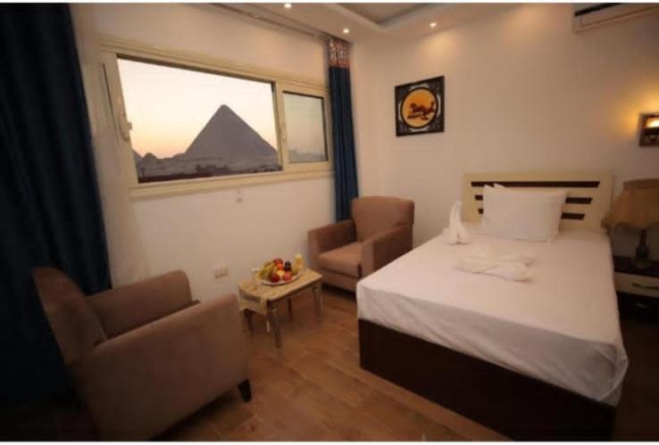Hotel Pyramid View Gh Kafret el-Gabal Esterno foto